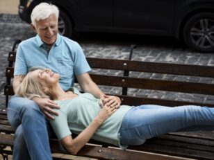 romantic elder couple enjoying their time bench outdoors scaled