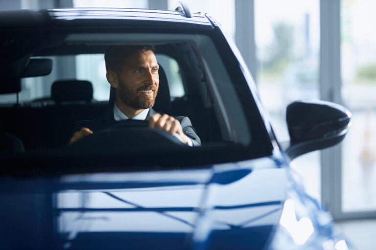 businessman suit buying new car modern salon scaled