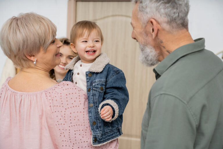 carefree child in denim jacket smiling near mother 2024 11 08 12 02 49 utc scaled
