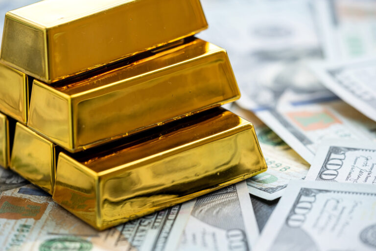gold bars new 100 dollar banknotes saving concept economy scaled