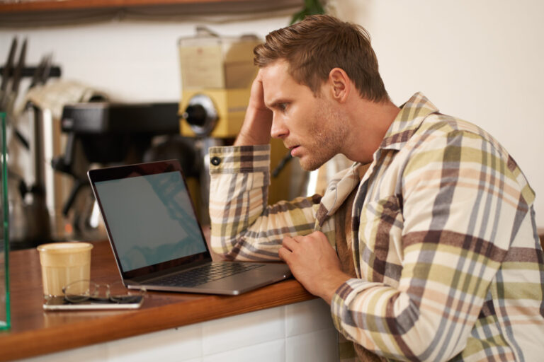 image adult man looking complicated laptop screen staring puzzled his monitor doing scaled