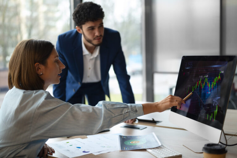 people office analyzing checking finance graphs scaled